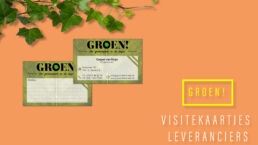 Business cards on a mango colored background